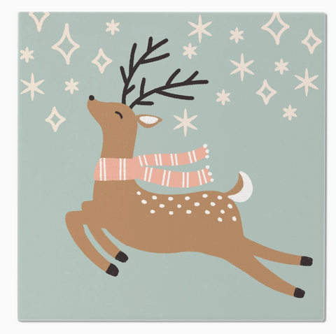Ceramic trivet illustration of a deer wearing a scarf on a light blue background with star patterns